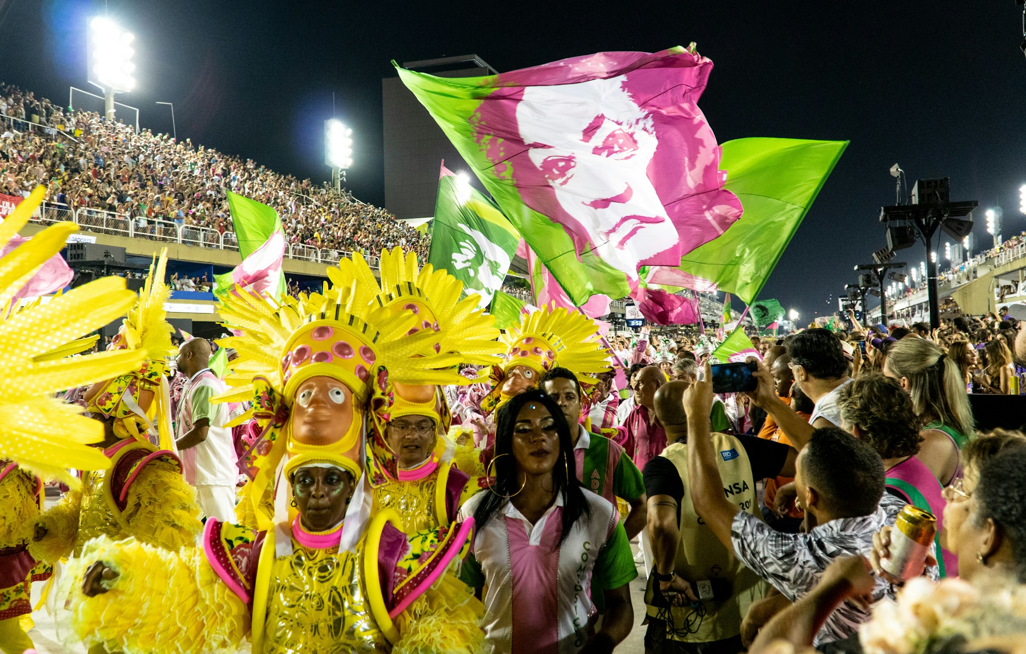 Vibrant samba dancers in colorful costumes during Rio Carnival with drums and celebration